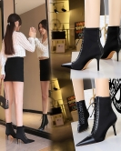 Fashion sex, showing thin women's boots, thin heels, high -heeled and pointed tip lacers cross -binding short boots