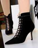 Fashion sexy nightclub shows thin heel high -heeled pointed pointed tie crossbone cut -out hollow boots