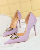 Wind nightclub high -heeled shoes women's shoe fine heel pointed pointed pointed side hollow metal rivet buckle single shoe women