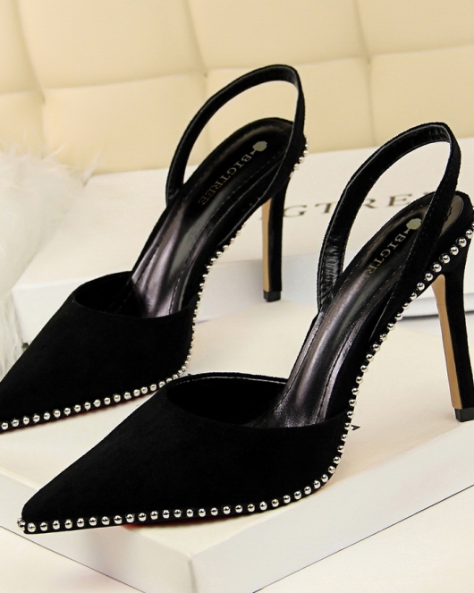 Wind sexy nightclub is thin, high -heeled fluffy, shallow mouth hollow cutouts, stumbling stumbling rivet pointed female sandals