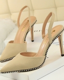 Wind sexy nightclub is thin, high -heeled fluffy, shallow mouth hollow cutouts, stumbling stumbling rivet pointed female sandals