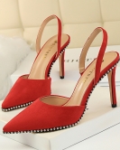 Wind sexy nightclub is thin, high -heeled fluffy, shallow mouth hollow cutouts, stumbling stumbling rivet pointed female sandals